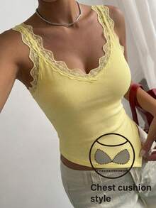 Livesso Áo camisole nữ màu trơn cổ chữ V hở lưng phối ren không tay vạt bất đối xứng - Màu vàng - Xem 1