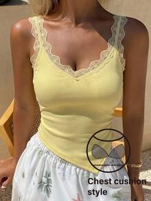 Livesso Áo camisole nữ màu trơn cổ chữ V hở lưng phối ren không tay vạt bất đối xứng - Màu vàng - Xem 5