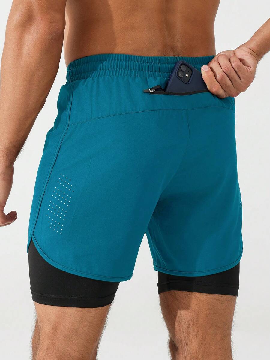Gym Rark Manfinity Fitness Short de sport 2 en 1 pour homme avec taille à cordon, extensible, avec poche pour téléphone, short de gym, short court pour homme, short de basket-ball pour homme, gel désinfectant, école - Bleu canard - Voir 1
