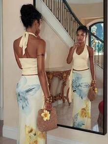 Aloruh Trang phục nghỉ hè cho nữ: Áo crop top cổ xếp ly in họa tiết hoa nhiệt đới và chân váy đuôi cá xếp tầng gợi cảm. Đồ đi biển mùa hè, trang phục nghỉ mát biển cho nữ, trang phục nghỉ mát nhiệt đới phong cách Bohemian cho nữ, đồ đi biển lưới hoa cho nữ, bộ đồ in hoa màu vàng, trang phục nghỉ mát nhiệt đới cho nữ, bộ đồ mùa hè. - Vàng nhạt - Xem 4