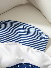 SHEIN 這套 3 件式服裝專為青少年設計，採用時尚休閒的無肩帶短版上衣，搭配藍白配色以及圓點與條紋數位印花。設計美觀且百搭，適合與各種衣物搭配。面料舒適且具彈性，非常適合日常穿著、戶外活動、派對及旅行，是夏季穿搭的理想選擇。 - 彩色 - 查看 5