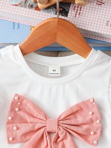 Souflis Souflis Setelan 2 potong untuk anak perempuan usia 4-7 tahun, terdiri dari atasan lengan bergelombang berhiaskan manik-manik dan celana pendek berbelahan pinggang elastis berwarna pink dengan hiasan manik-manik, cocok untuk dipakai sehari-hari, pesta, dan acara lainnya. - Berwarna merah muda - View 6
