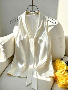 SHEIN LUNE 女款夏季優雅白色上衣，緞面緞帶無袖襯衫，V領蝴蝶結背心上衣，絲綢質感緞帶掛脖襯衫，通勤風，成熟時尚，淑女風，高端，垂墜感，顯瘦，春夏新款，秋冬內搭，通勤穿搭，職場，約會，晚宴，會議，商務洽談，沙灘穿搭，日常百搭，外套/內搭休閒襯衫 - 米色 - 查看 1