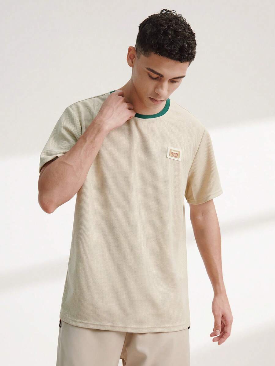 Kaos Pria dengan Kerah Bergaris Bertekstur Jacquard - Aprikot - View 1