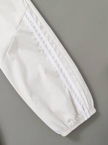 SHEIN Explorewe 2-Pack Tween Boys All-Match Versatile Side Asymmetrical Stripe Solid Color Pants Elastic Cuff Loose Fit Casual Trousers - Black and White - View 4