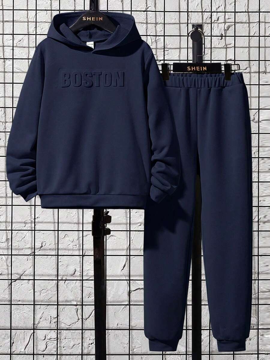 SHEIN Conjunto de 2 piezas de sudadera con capucha de unicolor con relieve y pantalones de punto casuales y cómodos para niño preadolescente - Azul Marino - Ver 1