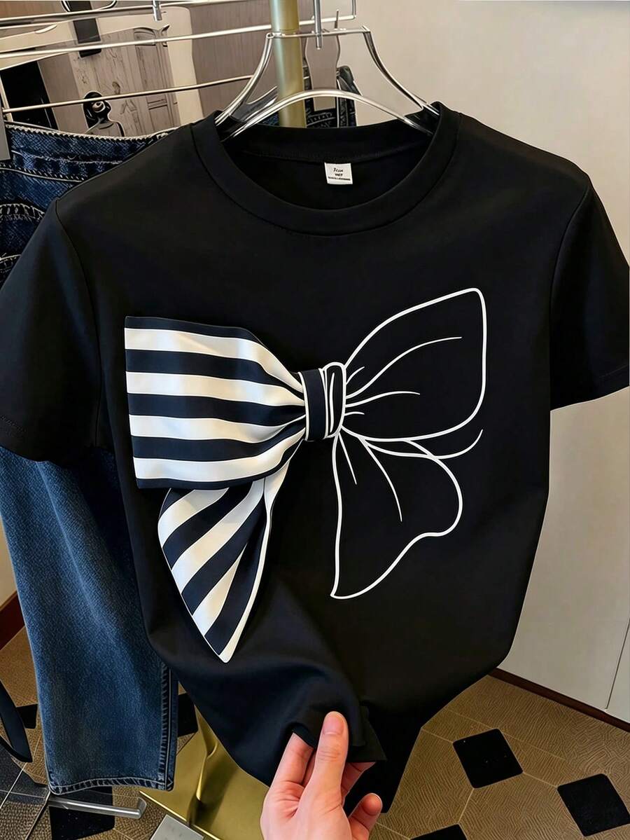 SHEIN Sparklyn 青少年女孩夏季休閒時尚百搭日常珍珠裝飾蝴蝶結圖案白色短袖圓領T恤 1件 - 黑色 - 查看 1