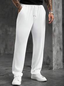 Manfinity CasualCool Pantalones de chándal casuales holgados para hombre de unicolor con cintura elástica, cordón y bolsillos - Blanco - Ver 4