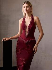 MOTF Soiréza ELEGANT WOMEN'S SLEEVELESS HALTER NECK MAXI PARTY GOWN WITH WAVY DEEP V-NECKLINE, PEARL EMBELLISHMENTS AT NECKLINE, UPPER BODY & HEM, 3D FLORAL APPLIQUE FABRIC WITH INTRICATE PATTERNS AT SKIRT - Burgundy - View 5