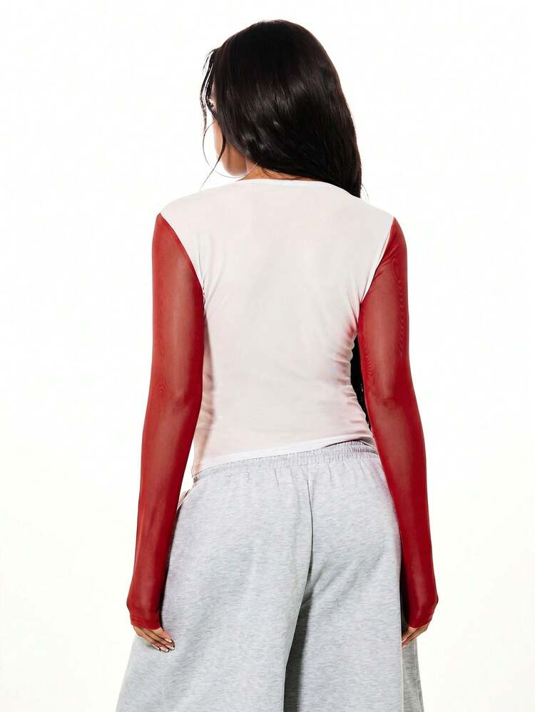 SUMWON Color Block Mesh Long Sleeve Graphic Crop Top