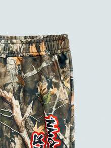 Modcrash Plus Size Men's Loose Fit Cartoon Red & White Graffiti Figure & Branch Camouflage Print Knit Short Sleeve T-Shirt & Pants Set, Casual & Fashionable, Plus Size Fit, Perfect For Dates And Gatherings, Great Gift For Boyfriend - Multicolor - View 13