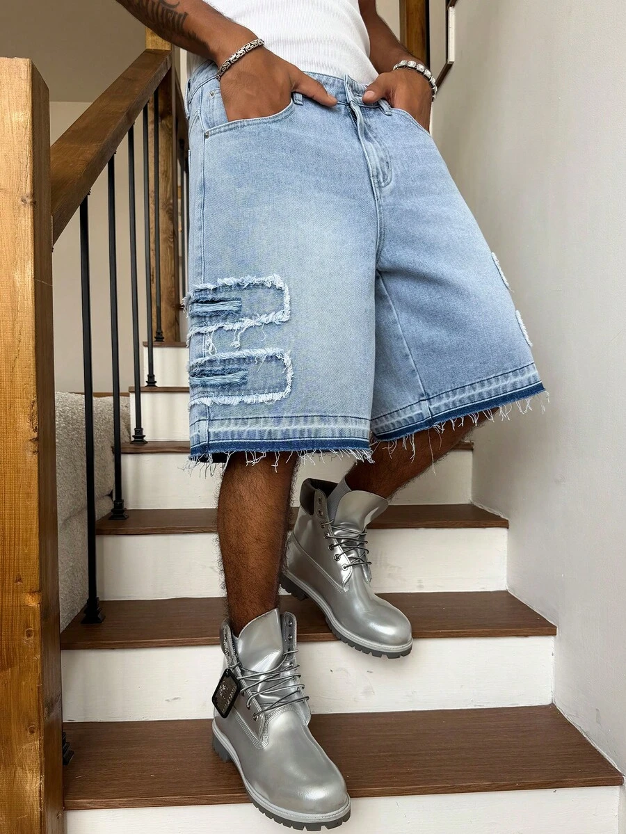 Manfinity EMRG Celana Pendek Denim Pria Warna Biru Muda dengan Potongan Lebar dan Efek Sobek, Gaya Streetwear Y2K - Biru - View 1