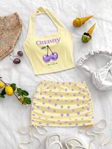 Soleia Áo croptop nữ hở lưng họa tiết anh đào phong cách tối giản casual đi chơi, chân váy ngắn cạp thấp nhún họa tiết chấm bi, áo thun họa tiết, phù hợp mặc mùa hè và dạo phố ngoài trời - Màu vàng - Xem 1
