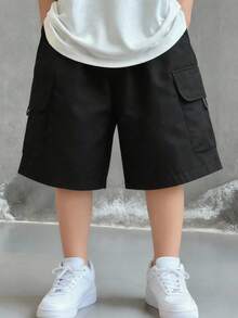 SHEIN 青少年男童休闲日常舒适贴袋宽松纯色梭织短裤，适合春夏穿着，日常穿着、运动、郊游、上学、聚会、节日、拍照等场合。 - 黑色 - 查看 4