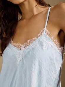 Briarwyn Canottiera da donna con patchwork in pizzo e orlo asimmetrico, top fashion - celeste - Visualizzare 9