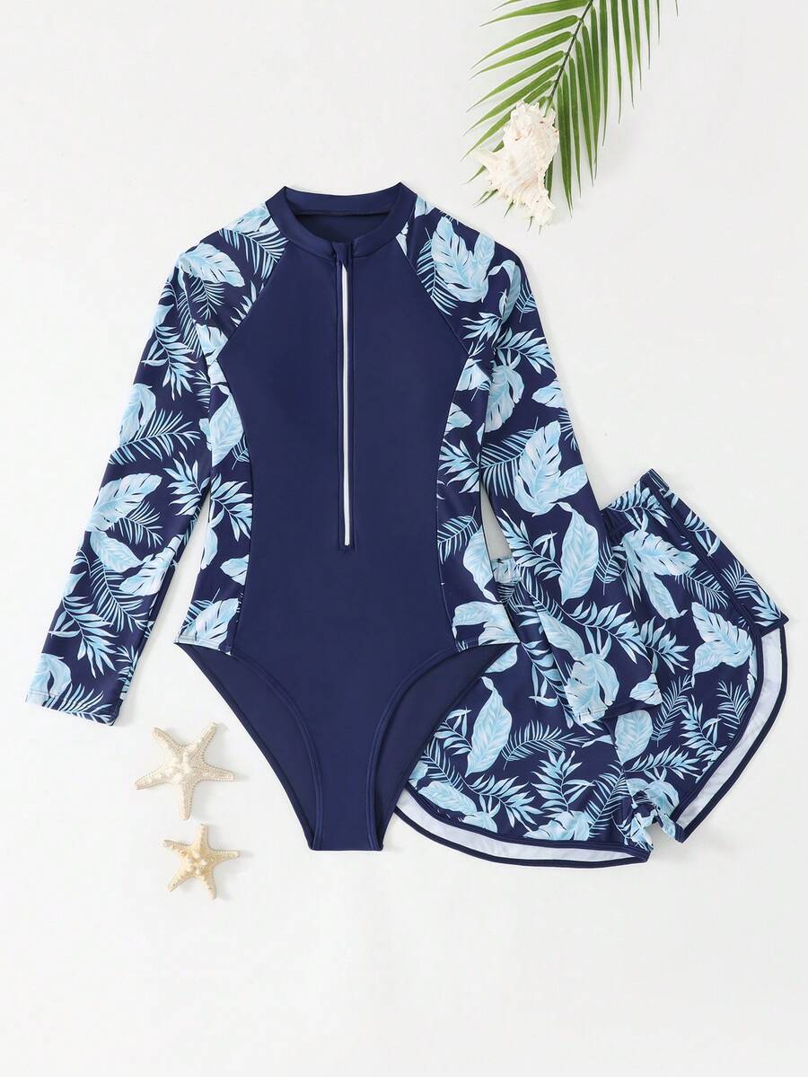 SHEIN 青少年女孩一件式泳衣 & 短褲兩件套裝,長袖附拉鍊,新品上市。適合春/夏海灘游泳。配色紫色花卉印花圖案,時尚設計。舒適面料,清新且時尚 - 彩色 - 查看 1
