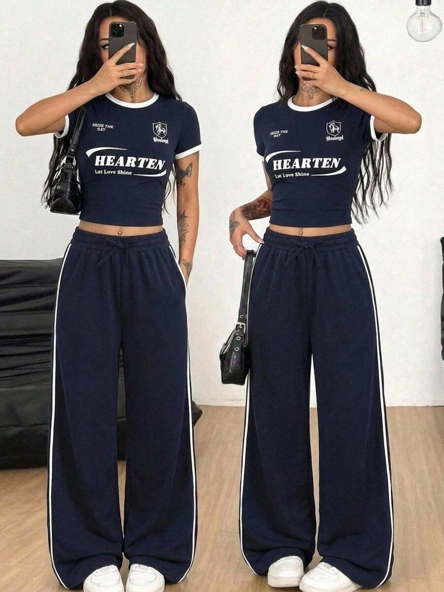 SHEIN 青少年女孩春夏新款時尚休閒極簡白色印花T恤與黑白花卉條紋針織長褲兩件套,居家、外出、上學、度假皆適用,童裝 - 黑與白 - 查看 1