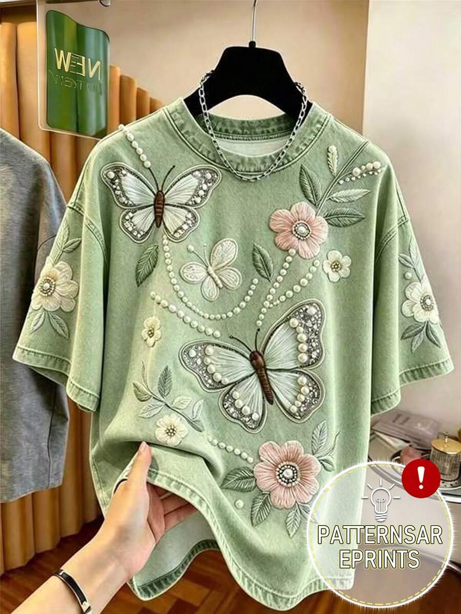 Resyla 女款T恤,仿牛仔刺繡工藝,仿珠飾圖案印花T恤,圓領短袖寬鬆版型T恤,優雅女款T恤,適合日常穿著與約會場合。女款短袖上衣,夏季女款上衣,最新女款上衣,蝴蝶花卉刺繡圖案T恤 - 彩色 - 查看 1