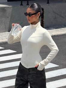Muchica Chaqueta de manga larga de punto ajustada con protección solar para mujer en otoño/invierno en color albaricoque - Albaricoque - Ver 1