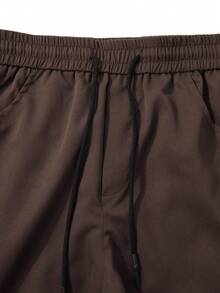 Manfinity Homme Pantalones casuales de hombre con bolsillos de carga y cordón en la cintura, unicolor, otoño - Café integral - Ver 5
