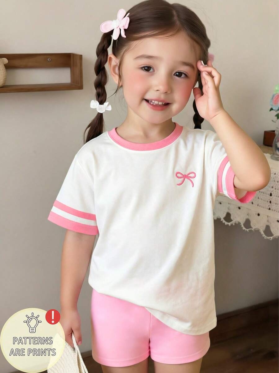 少女 T-shirt,復古美式校園經典 Logo 圖案短袖套頭衫,適合夏季穿著,美式大學風度假穿搭,白色修身休閒日常風,粉色花卉條紋時尚風,舒適百搭適合日常穿著;馬術風粉色修身短套裝,適合春夏秋冬;粉色滾邊 T-shirt - 彩色 - 查看 1