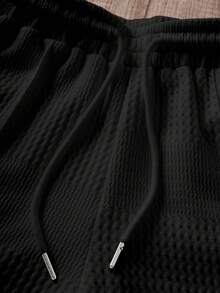 Manfinity Joysei 男士夏季休閒純色紋理布料半拉鍊短袖 Polo 衫短褲兩件套 - 黑色 - 查看 5