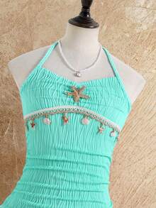 Sparklyn Vestido de verano con cuello de halter, volantes en el bajo y decoración de estrellas de mar y conchas para niñas preadolescentes - Albaricoque - Ver 7