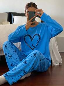 Pyjamasset i bomull för kvinnor, 2 delar, långärmad topp med kontrastfärg och slogan-text samt sovbyxor med randigt hjärtmönster, hemmakläder - Blå - Visa 1