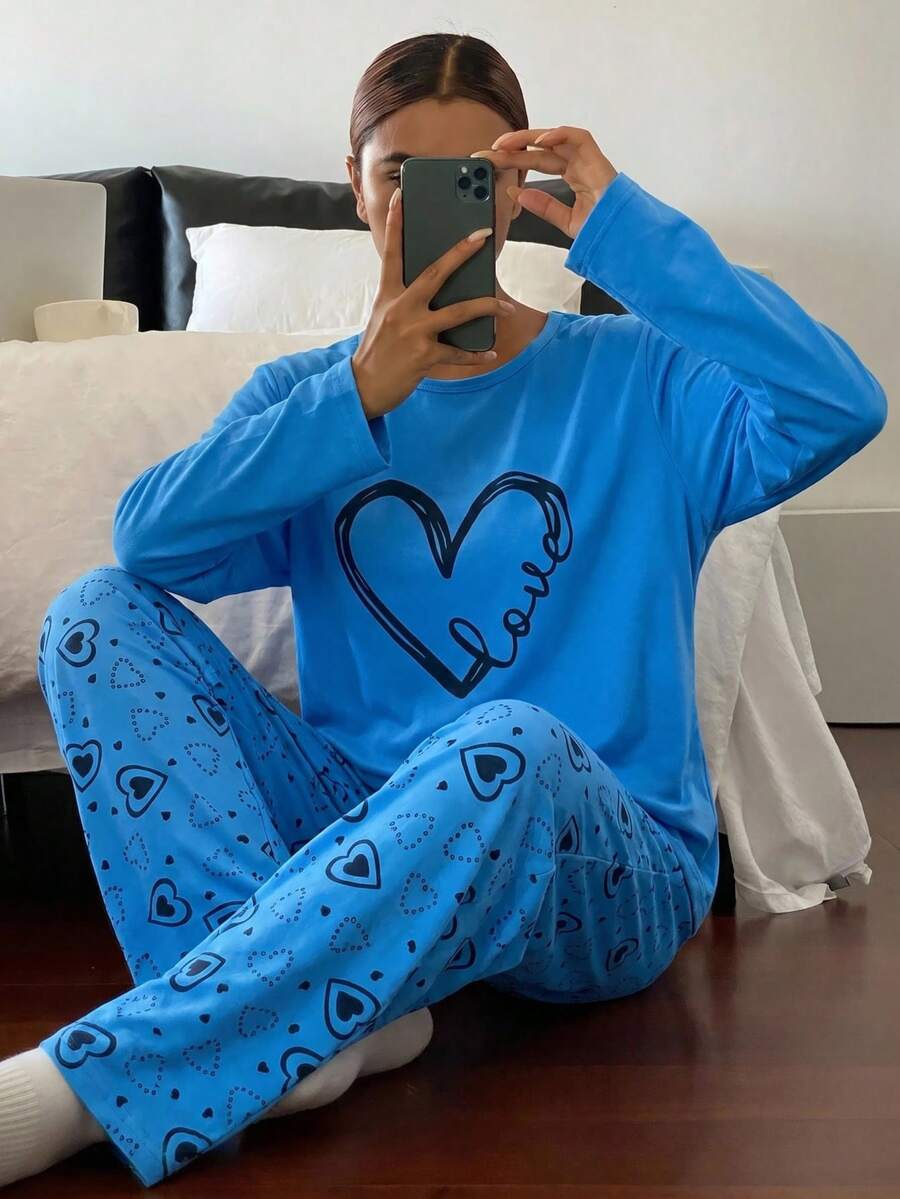 Pyjamasset i bomull för kvinnor, 2 delar, långärmad topp med kontrastfärg och slogan-text samt sovbyxor med randigt hjärtmönster, hemmakläder - Blå - Visa 1