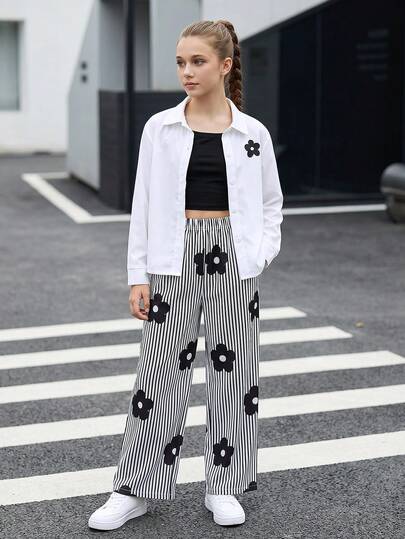 SHEIN Bộ 3 món thời trang thường ngày cho bé gái tuổi teen phong cách thanh lịch tối giản, phối dễ dàng: áo sơ mi tay dài cổ bẻ họa tiết hoa, vạt mở, màu đen trắng; áo crop top ôm sát màu đen trơn mặc trong; quần ống rộng suông họa tiết sọc, chất vải mềm mịn, phù hợp đi học, dã ngoại, tiệc tùng, hoạt động trong nhà và ngoài trời, mùa xuân hè thu