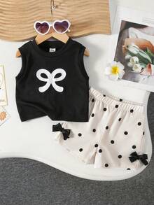 SHEIN Playful Pals 2件/套 嬰兒女童春夏季新款背心上衣與短褲套裝，黑色蝴蝶結印花無袖上衣 + 米色波點蝴蝶結裝飾短褲，柔軟可愛親膚休閒百搭時尚套裝 - 黑與白 - 查看 9
