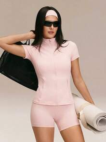 GLOWMODE FeatherFit™ Cool Contour Buttery-Soft Sweat-Wicking Stretchy Slim-Fit Short-Sleeve Zippered Side Pockets Zip-Up Jacket Low Impact Yoga Pilates Studio Daily Active Wear - Baby Pink - View 7