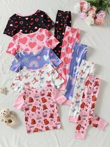 [Enviado al azar 1 set]Pijama de 2 piezas para bebé niña con top de cuello redondo y manga corta y pantalones largos. Este conjunto rosa claro y blanco presenta un estampado caprichoso de elefante de dibujos animados y estrellas de buenas noches con nubes y lazos. Confeccionado en tela de punto suave para una sensación agradable al tacto durante el descanso casual y el sueño en todas las estaciones. - Multicolor - Ver 2