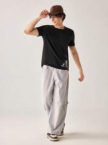 Strevion TOM & JERRY Kaos Pria Minimalis Motif Grafis , Kerah Bulat, Lengan Pendek, Musim Panas - Hitam - View 7
