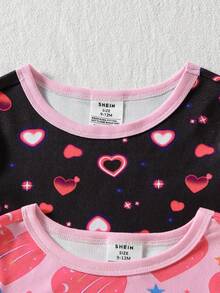 [Enviado al azar 1 set]Pijama de 2 piezas para bebé niña con top de cuello redondo y manga corta y pantalones largos. Este conjunto rosa claro y blanco presenta un estampado caprichoso de elefante de dibujos animados y estrellas de buenas noches con nubes y lazos. Confeccionado en tela de punto suave para una sensación agradable al tacto durante el descanso casual y el sueño en todas las estaciones. - Multicolor - Ver 3