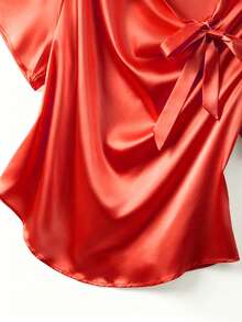 GlowEve CURVE Plus Size Women's Asymmetric Neckline Tie Bow Short-Sleeved Top With A Glossy Finish, Elegant And Going-Out Style, Perfect For Business Casual Summer Women's Outfits. - Orange - View 6