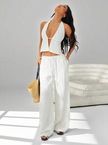 SHEIN PETITE Bộ đồ 2 mảnh gồm áo tank top buộc dây cổ yếm hở lưng và quần ống rộng có dây rút. Thích hợp cho đi club, đi nghỉ mát, đi biển, dự tiệc rave, đi nghỉ ở Hawaii. - trắng - Xem 7