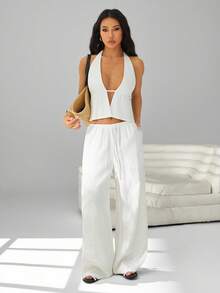 SHEIN PETITE Bộ đồ 2 mảnh gồm áo tank top buộc dây cổ yếm hở lưng và quần ống rộng có dây rút. Thích hợp cho đi club, đi nghỉ mát, đi biển, dự tiệc rave, đi nghỉ ở Hawaii. - trắng - Xem 9