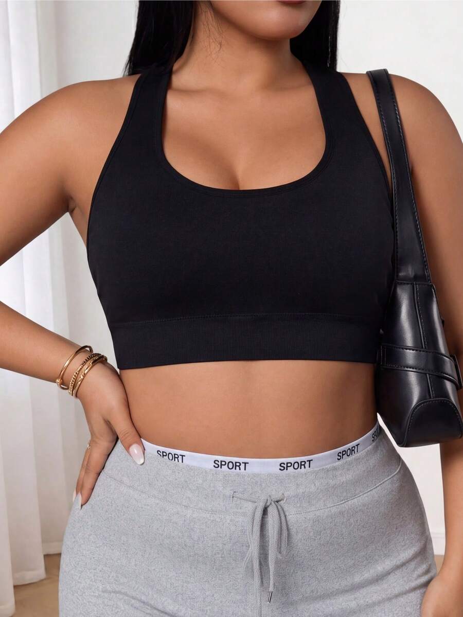 Breezaya Seamless Solid Color Round Neck Plus Size Women Sports Bra, Criss-Cross Back Design Plus Size Sports Bra, Back Shaping Function - Black - View 1