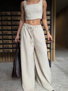 BiaLiraa Nouveau ensemble 2 pièces pour le printemps/été : débardeur avec bretelles en arêtes de poisson et pantalon large avec poches. Matière texturée. - Kaki - Voir 4