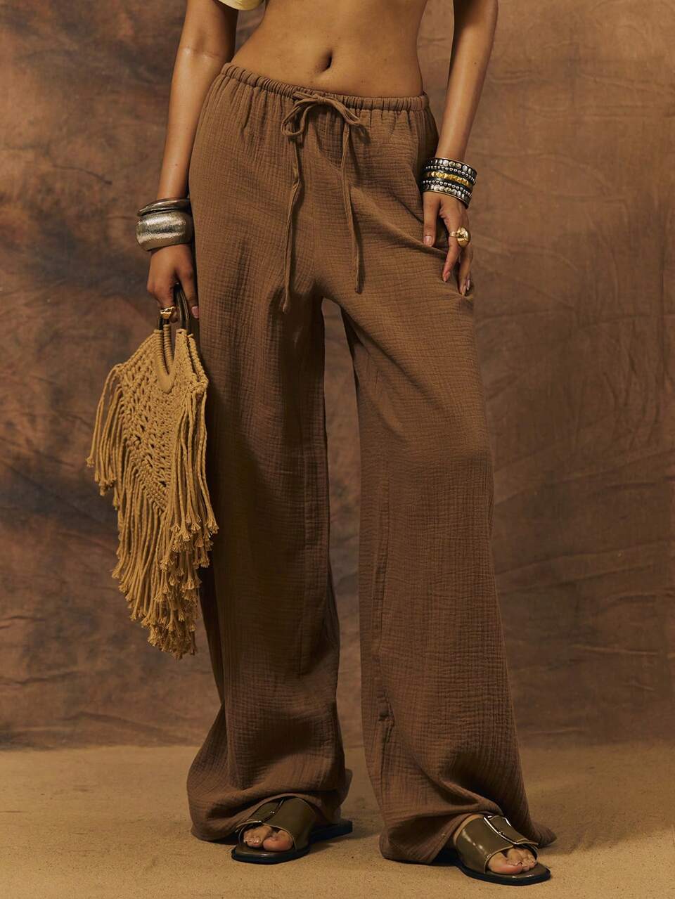 Pantalón de pierna ancha fluido con cintura elástica y cordón ajustable, estilo tela de queso texturizada, para festivales y vacaciones