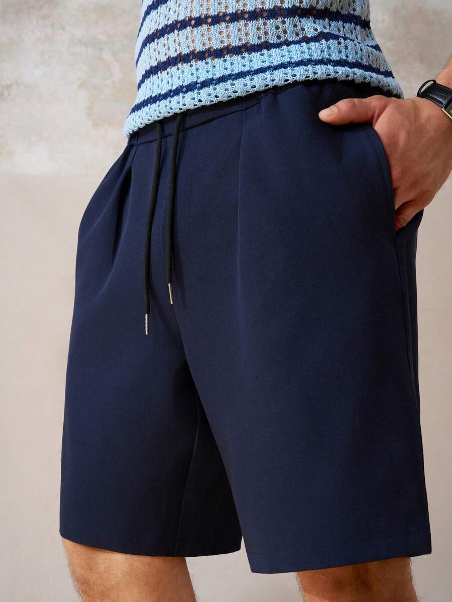 Airaco Pantalones cortos de hombre de verano, de uso diario y casual, de unicolor, con cordón en la cintura, bolsillos en diagonal y costuras delanteras - Azul Marino - Ver 1