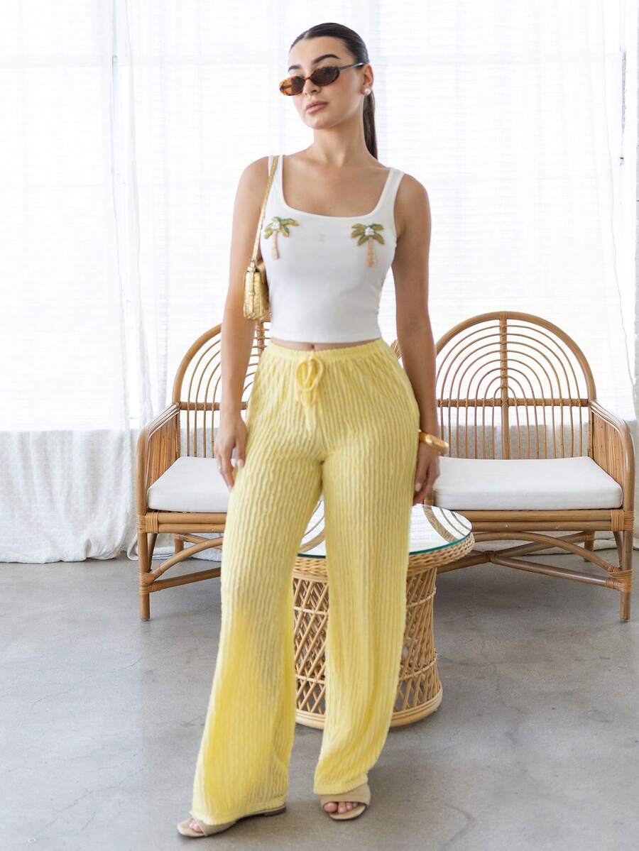 Andrea Bello 2026 Pantalones sueltos de verano con pliegues de moda para mujer, pantalones anchos de pierna suelta con textura de cordón, pantalones anchos de punto casuales, pantalones de playa transparentes para vacaciones, para festival de música y fiesta - Amarillo claro - Ver 1