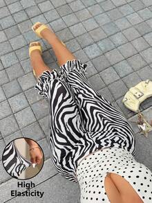 Muchica Plus Size Zebra Print Casual Ruffle Hem 3/4 Leggings - Black and White - View 1
