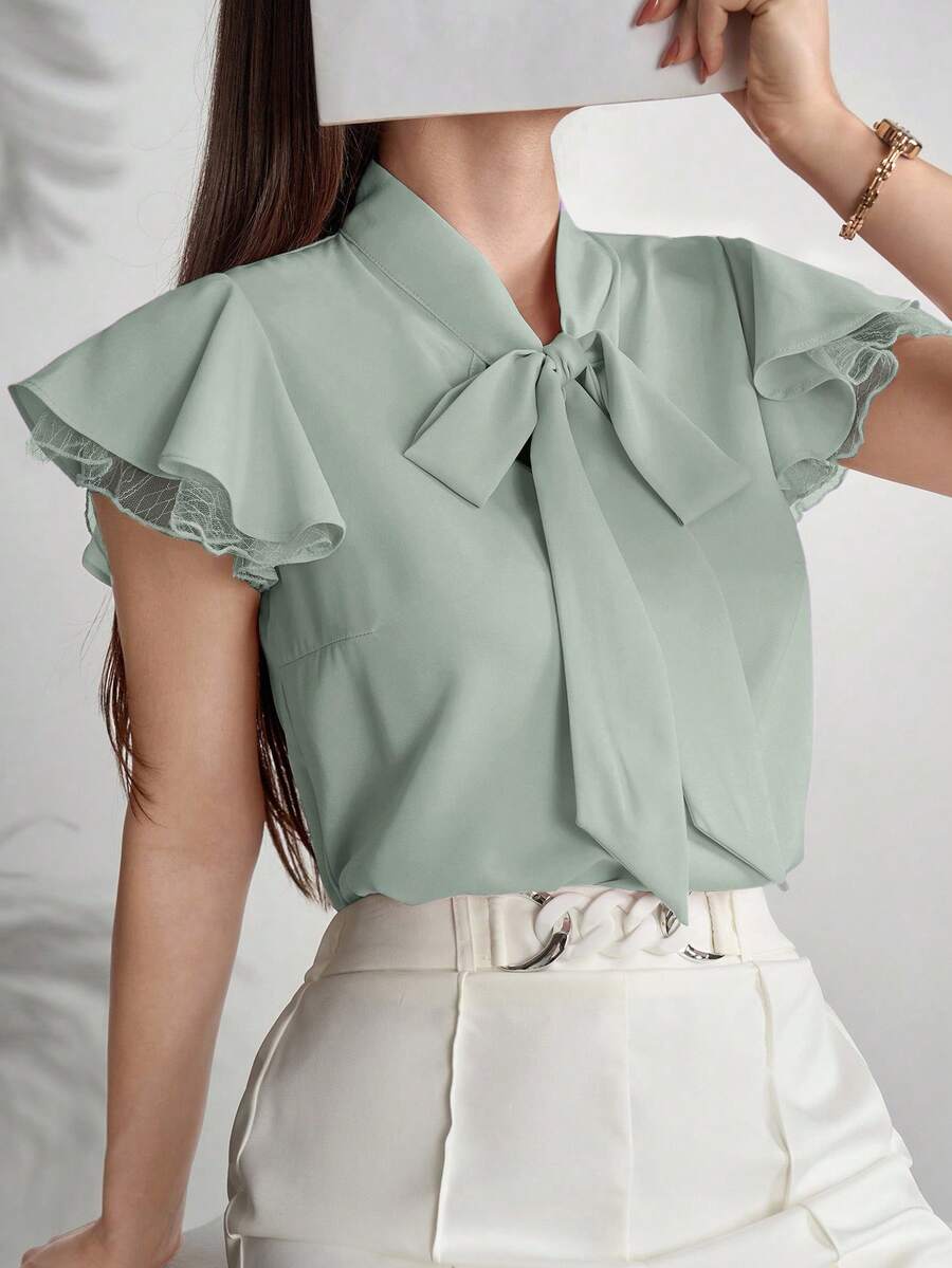 Modelyn Blus Wanita Warna Polos Kerah Ruffle Lengan Pendek Elegan untuk Bisnis Kasual Kantor Warna Hijau Sage Musim Panas - Hijau - View 1