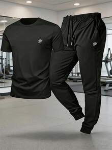 Gym Rark Men's Printed Short Sleeve T-Shirt And Drawstring Waist Long Pants Sports Set, Gym - Black - View 1