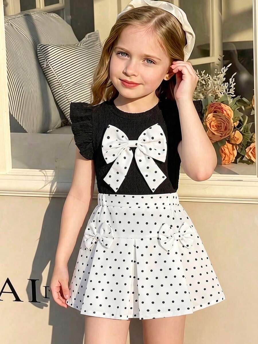 Elladie kids 2件組少女夏季魅力黑白女孩風 + 復古時尚輕盈透氣面料圓點印花荷葉袖鬆緊上衣 & A字裙套裝，附蝴蝶結裝飾，適合夏季穿搭、生日穿搭、海灘週末、度假浪漫、島嶼風、都市盛會、休閒穿著、戶外野餐、度假、早午餐約會，完美打造甜美俏皮公主造型
