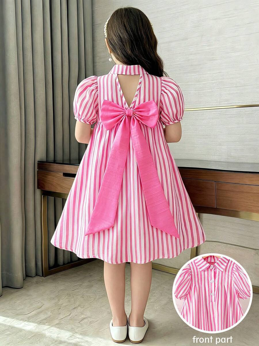 SHEIN Elladie kids Đầm sọc hồng cho bé gái, điểm nhấn là chiếc nơ hồng ngoại cỡ, tay phồng ngắn, cổ Peter Pan, kiểu dáng thường ngày, thích hợp cho kỳ nghỉ hoặc mặc hàng ngày.
