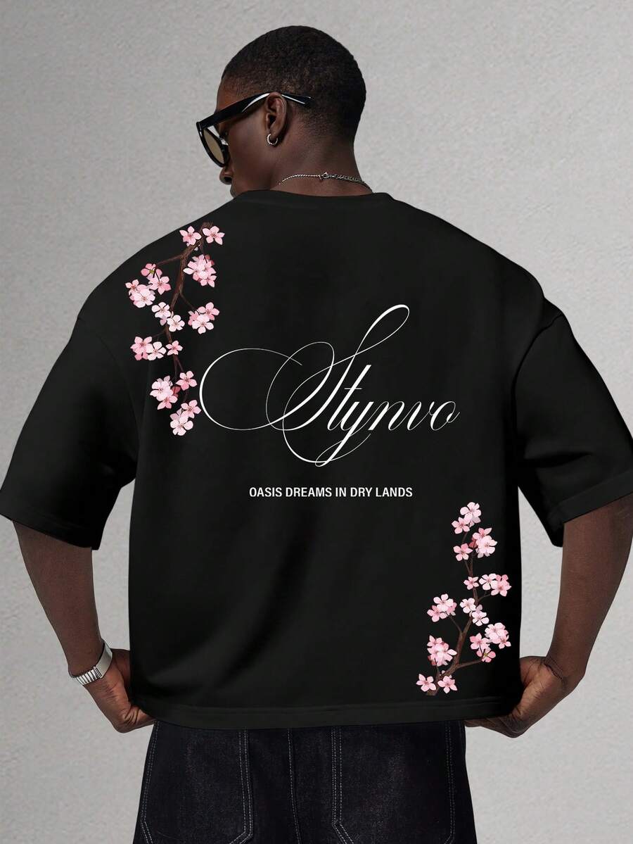 STYNVO Kaos Pria Fashion Motif Bunga & Huruf, Leher Bulat, Lengan Pendek - Hitam - View 1