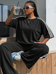Muchica Set de 2 piezas Blusa y pantalones de talla grande con bloques de color contrastante y cuello redondo de manga corta - Blanco y Negro - Ver 5
